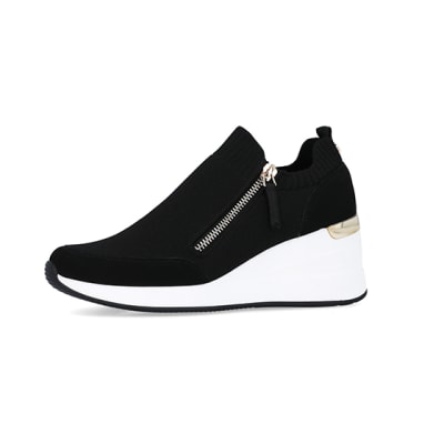 360 degree animation of product Black slip on wedge trainers frame-2
