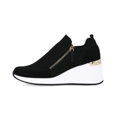 360 degree animation of product Black slip on wedge trainers frame-3