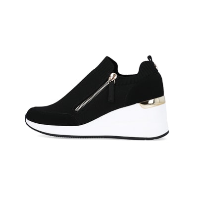 360 degree animation of product Black slip on wedge trainers frame-4
