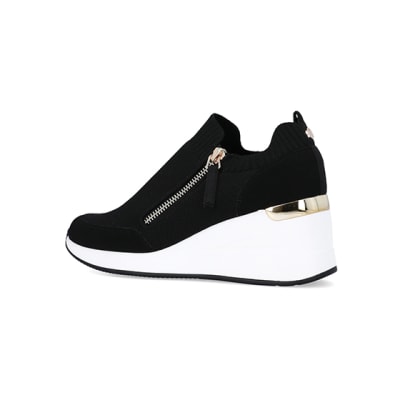 360 degree animation of product Black slip on wedge trainers frame-5