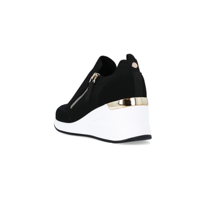 360 degree animation of product Black slip on wedge trainers frame-7