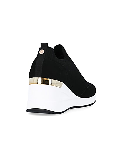 360 degree animation of product black slip on wedge trainers frame-11