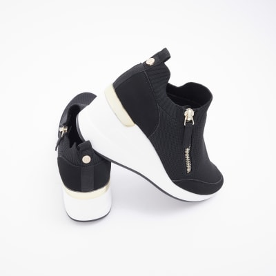 Black slip on wedge trainers | River Island