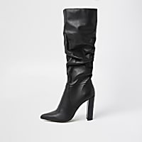Black slouch leather high leg boots