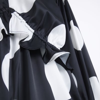 Black spot long sleeve playsuit