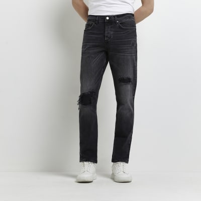 Black straight fit ripped jeans River Island