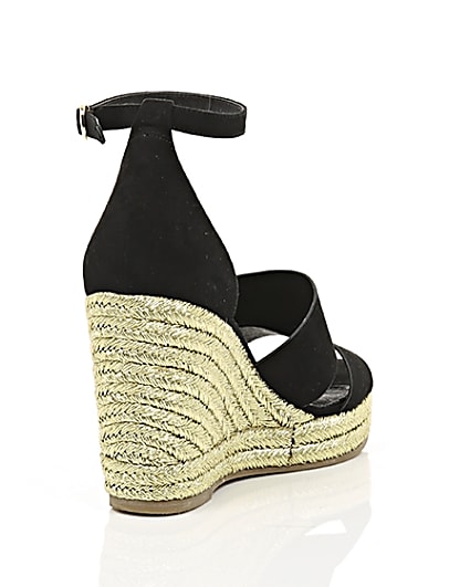 360 degree animation of product Black strappy gold espadrille wedges frame-14