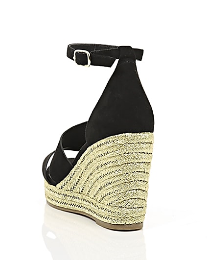 360 degree animation of product Black strappy gold espadrille wedges frame-17