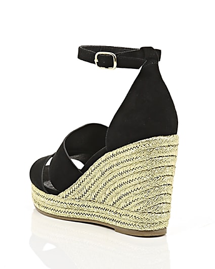 360 degree animation of product Black strappy gold espadrille wedges frame-18