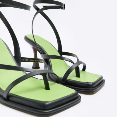 Black strappy heeled sandals