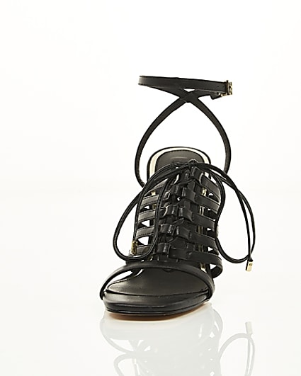 360 degree animation of product Black strappy lace up heel sandals frame-3