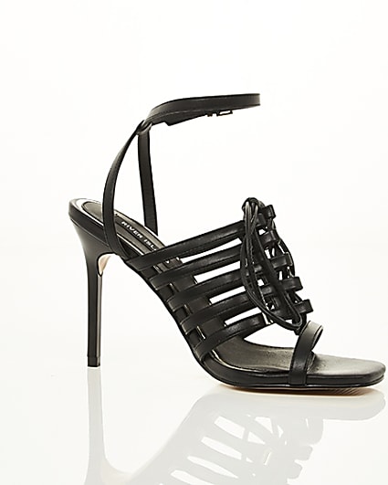 360 degree animation of product Black strappy lace up heel sandals frame-8