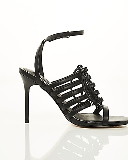 360 degree animation of product Black strappy lace up heel sandals frame-9