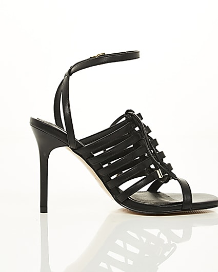 360 degree animation of product Black strappy lace up heel sandals frame-10