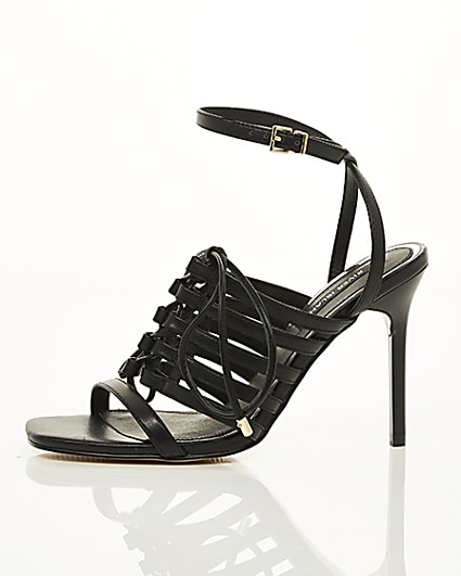 360 degree animation of product Black strappy lace up heel sandals frame-22