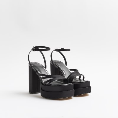 Black strappy platform heeled sandals