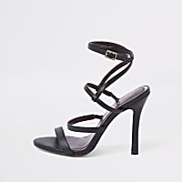 Black strappy skinny heel sandals