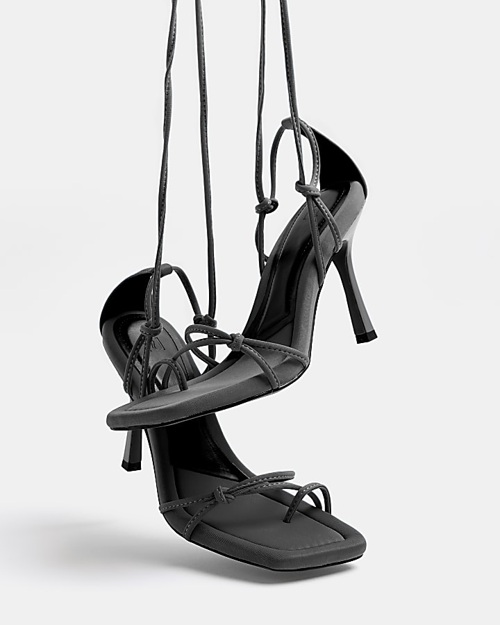 Black strappy tie up heeled sandals