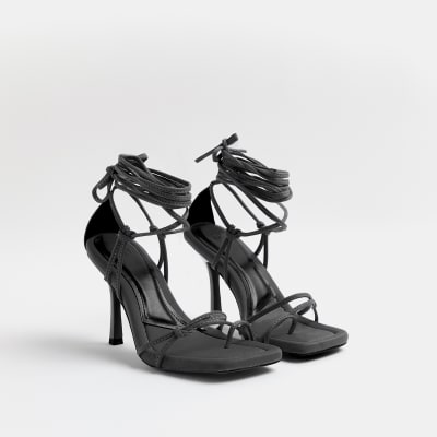 Black strappy tie up heeled sandals
