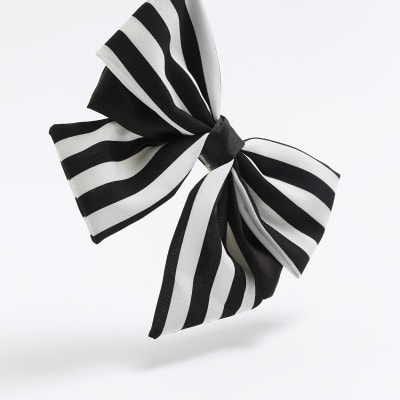 Black stripe bow hair clip | River Island