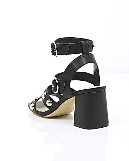 360 degree animation of product Black stud block heel sandals frame-18