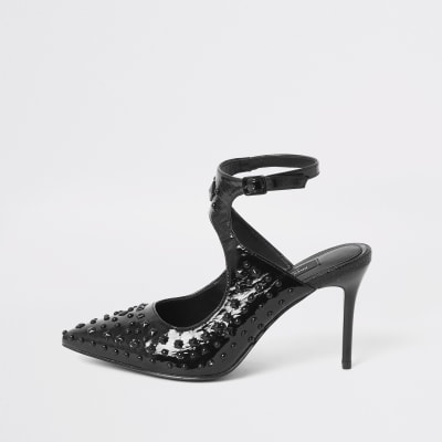 black studded court shoes