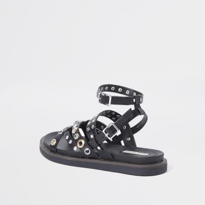 Black studded flat sandals