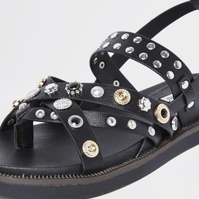 Black studded flat sandals