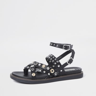 Black studded flat sandals