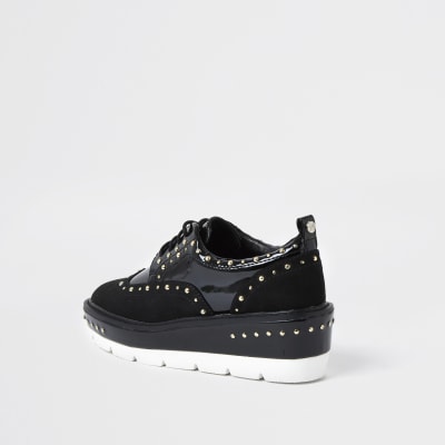 Black studded flatform brogues
