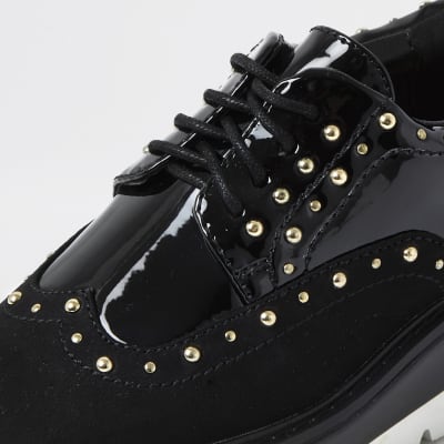 Black studded flatform brogues