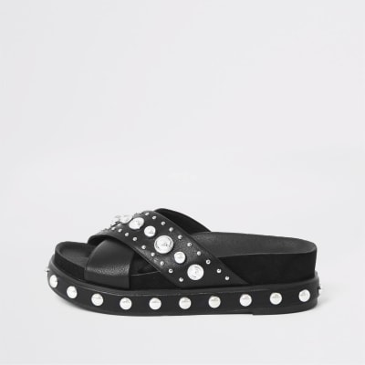 black studded flatforms