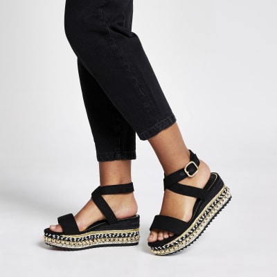 black studded flatforms