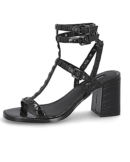 360 degree animation of product Black studded gladiator block heel sandals frame-2