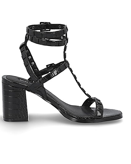 360 degree animation of product Black studded gladiator block heel sandals frame-15