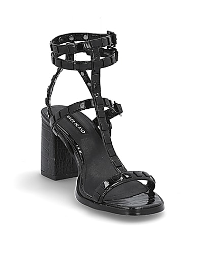 360 degree animation of product Black studded gladiator block heel sandals frame-19