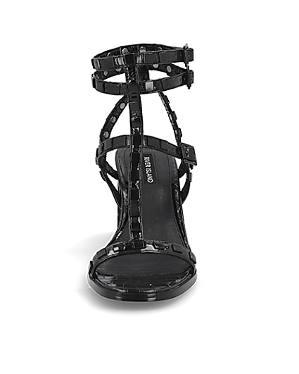 360 degree animation of product Black studded gladiator block heel sandals frame-21