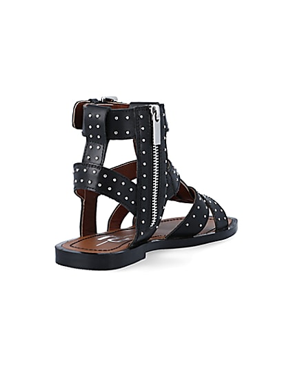 360 degree animation of product Black studded gladiator sandals frame-11