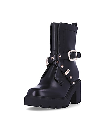 360 degree animation of product Black studded heeled ankle boots frame-23