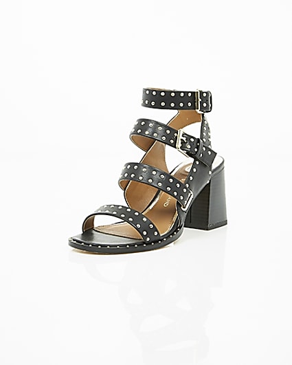 360 degree animation of product Black studded strappy block heel sandals frame-1
