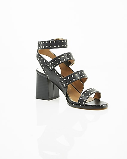 360 degree animation of product Black studded strappy block heel sandals frame-7