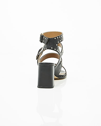 360 degree animation of product Black studded strappy block heel sandals frame-15