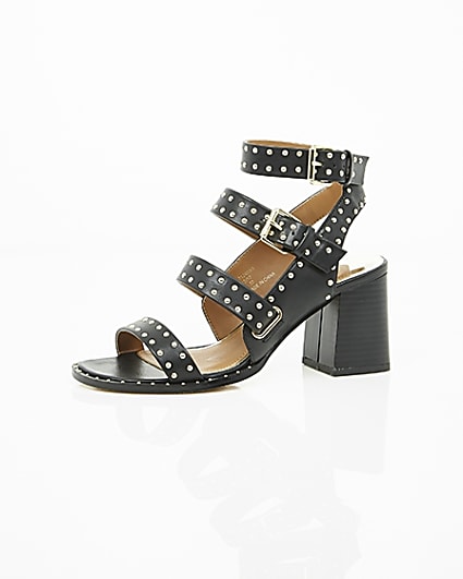 360 degree animation of product Black studded strappy block heel sandals frame-23
