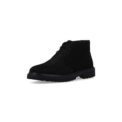 360 degree animation of product Black suede desert boots frame-0