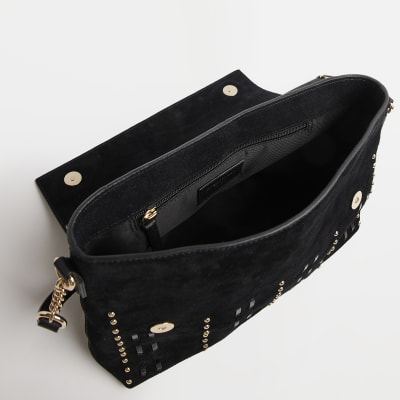 Black suede studded cross body bag River Island