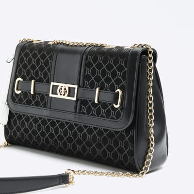 Black suedette RI monogram shoulder bag River Island