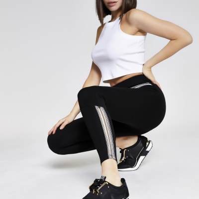 Black tape embroidered leggings