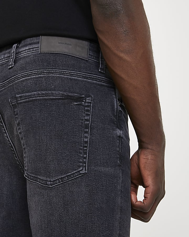 Black tapered denim jeans
