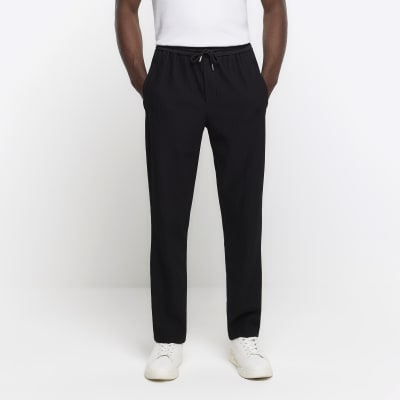 Black tapered fit plisse smart joggers River Island