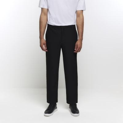 Black tapered fit plisse smart trousers